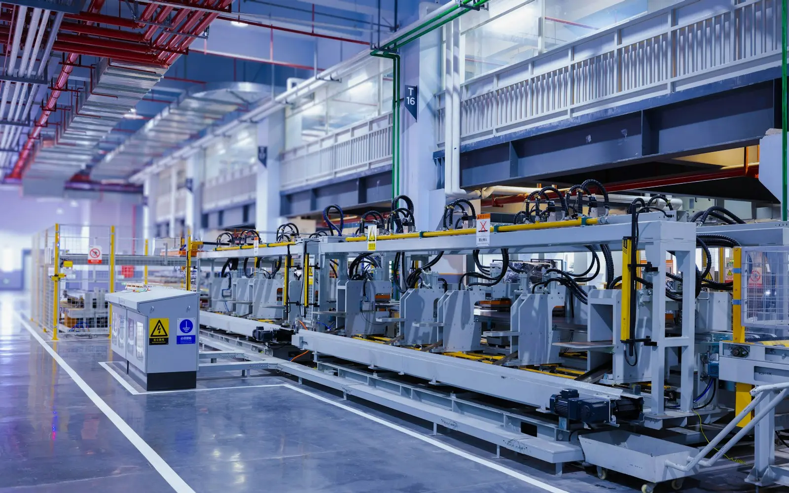 Automated production line with machinery on a bright factory floor
